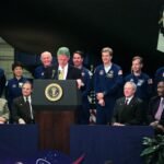 The STS-95 crew during their introductory press conference