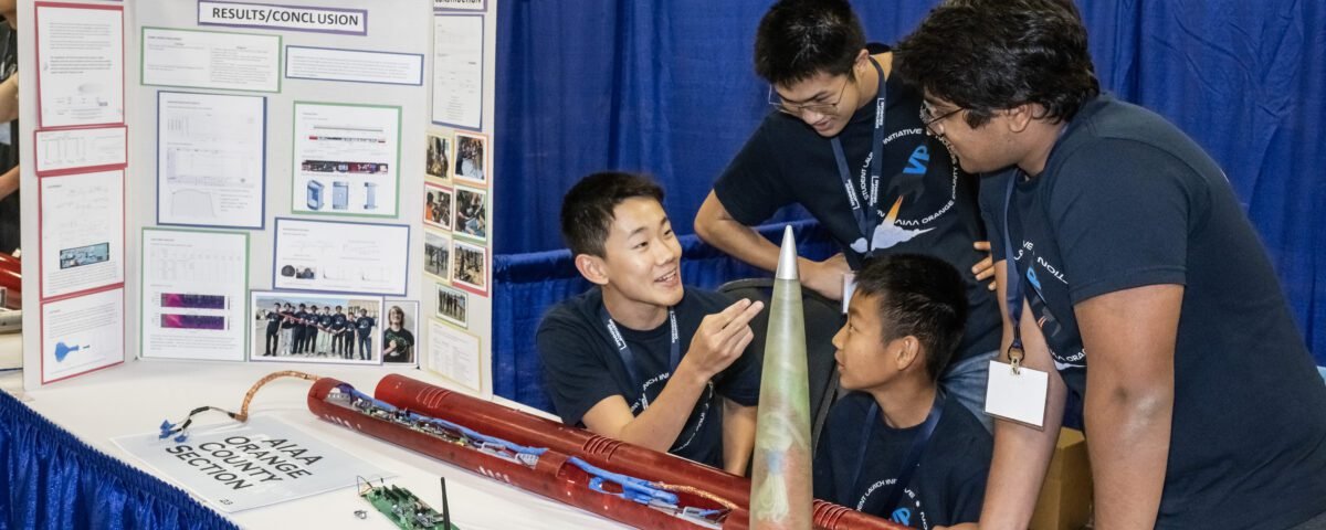 Students from the AIAA Orange Country Section team of Irvine, California, display their rocket to news media and the public during Rocket Fair – an annual showcase event of NASA’s Student Launch competition April 2023.