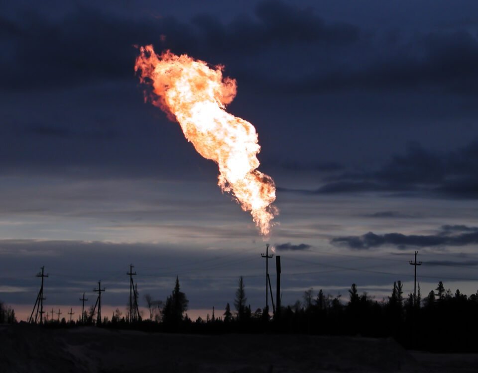 Picture of burning oil gas flare outdoors