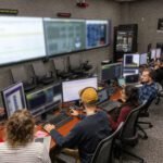 A team of engineers participates in simulation training for the Polar Resources Ice Mining Experiment-1 (PRIME-1) on Thursday, Nov. 2, 2023, inside the Neil Armstrong Operations and Checkout Building at NASA’s Kennedy Space Center in Florida.